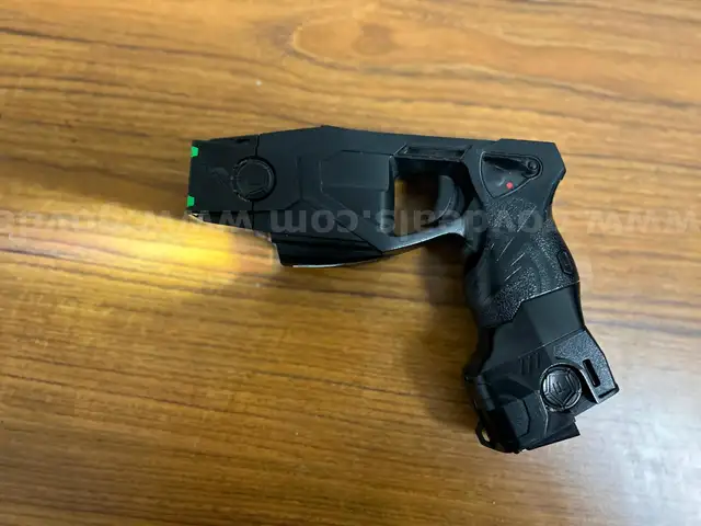 Taser X26P with DPM and Blackhawk right handed holster