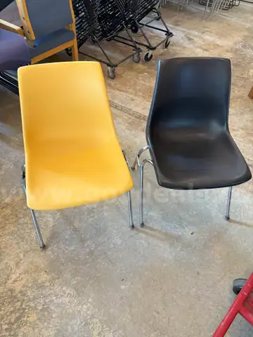 Lot of 37 Black and Yellow Plastic Chairs