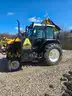 New Holland TS 100 Tractor with an Alamo Mower