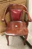 Antique wooden/leather/leatherette chairs used at US Mint.
