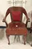 Antique wooden/leather/leatherette chairs used at US Mint.