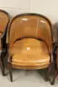 Antique wooden/leather/leatherette chairs used at US Mint.