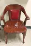 Antique wooden/leather/leatherette chairs used at US Mint.