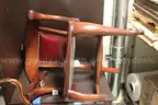 Antique wooden/leather/leatherette chairs used at US Mint.