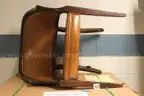 Antique wooden/leather/leatherette chairs used at US Mint.