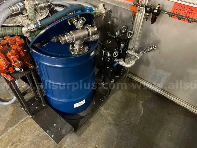 Portable fluid delivery system with pneumatic pump