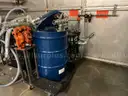 Portable fluid delivery system with pneumatic pump