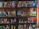 Massive mixed lot of cleaning products, including laundry detergent, dish soap, disinfectants, degreasers, sprays, powde