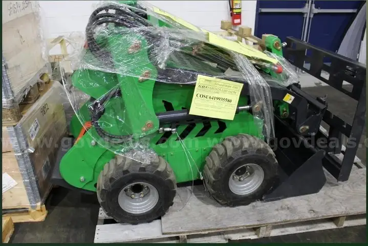 Qty of (3) Pallets, (2) Skid Steer Loader w/Parts, (1) Solar Panel Lift