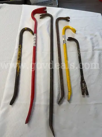 Lot of six (6) USED Pry Bars, and three (3) USED Car Spare Tire Wrenches