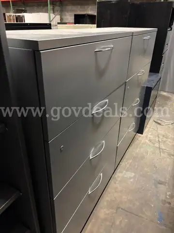 2 gray filing cabinets