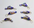 Estate Sale | Lot of (6) Vintage Gold Enamel Articulated Fish Pendants
