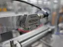 MiQ Machines with Fluidic Processing Machine and Cartridge Pouching Labeling Machine with BeiJer X2pro System Controller