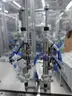 MiQ Machines with Fluidic Processing Machine and Cartridge Pouching Labeling Machine with BeiJer X2pro System Controller