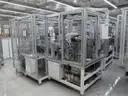 MiQ Machines with Fluidic Processing Machine and Cartridge Pouching Labeling Machine with BeiJer X2pro System Controller