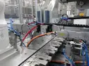 MiQ Machines with Fluidic Processing Machine and Cartridge Pouching Labeling Machine with BeiJer X2pro System Controller
