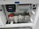 MiQ Machines with Fluidic Processing Machine and Cartridge Pouching Labeling Machine with BeiJer X2pro System Controller