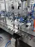 MiQ Machines with Fluidic Processing Machine and Cartridge Pouching Labeling Machine with BeiJer X2pro System Controller