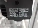 MiQ Machines with Fluidic Processing Machine and Cartridge Pouching Labeling Machine with BeiJer X2pro System Controller
