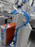 MiQ Machines with Fluidic Processing Machine and Cartridge Pouching Labeling Machine with BeiJer X2pro System Controller