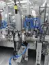 MiQ Machines with Fluidic Processing Machine and Cartridge Pouching Labeling Machine with BeiJer X2pro System Controller