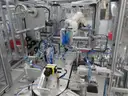 MiQ Machines with Fluidic Processing Machine and Cartridge Pouching Labeling Machine with BeiJer X2pro System Controller