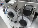 MiQ Machines with Fluidic Processing Machine and Cartridge Pouching Labeling Machine with BeiJer X2pro System Controller
