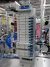 MiQ Machines with Fluidic Processing Machine and Cartridge Pouching Labeling Machine with BeiJer X2pro System Controller