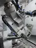 MiQ Machines with Fluidic Processing Machine and Cartridge Pouching Labeling Machine with BeiJer X2pro System Controller