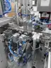 MiQ Machines with Fluidic Processing Machine and Cartridge Pouching Labeling Machine with BeiJer X2pro System Controller
