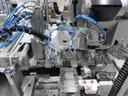 MiQ Machines with Fluidic Processing Machine and Cartridge Pouching Labeling Machine with BeiJer X2pro System Controller