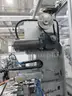 MiQ Machines with Fluidic Processing Machine and Cartridge Pouching Labeling Machine with BeiJer X2pro System Controller