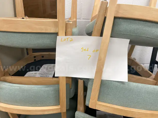 Lot #2 This is a set of 7 chairs