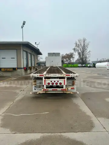 2001 Wabash flat bed with moffett