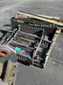 Misc. used spare parts: cylinders for CAT 350, lift axle for Mack, screens,  Volvo A40 hood, Cutter D6R, Couplers