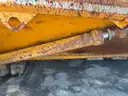 Misc. used spare parts: cylinders for CAT 350, lift axle for Mack, screens,  Volvo A40 hood, Cutter D6R, Couplers