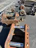 Misc. used spare parts: cylinders for CAT 350, lift axle for Mack, screens,  Volvo A40 hood, Cutter D6R, Couplers
