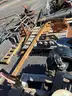 Misc. used spare parts: cylinders for CAT 350, lift axle for Mack, screens,  Volvo A40 hood, Cutter D6R, Couplers
