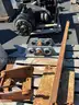 Misc. used spare parts: cylinders for CAT 350, lift axle for Mack, screens,  Volvo A40 hood, Cutter D6R, Couplers
