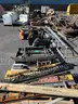 Misc. used spare parts: cylinders for CAT 350, lift axle for Mack, screens,  Volvo A40 hood, Cutter D6R, Couplers