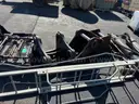 Misc. used spare parts: cylinders for CAT 350, lift axle for Mack, screens,  Volvo A40 hood, Cutter D6R, Couplers