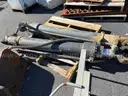 Misc. used spare parts: cylinders for CAT 350, lift axle for Mack, screens,  Volvo A40 hood, Cutter D6R, Couplers