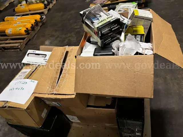 1 Pallet of Misc. Approx 7 boxes Trail Cameras, Scanners, Wireless Routers, Garmins & Radon Monitor (PICK-UP ONLY)