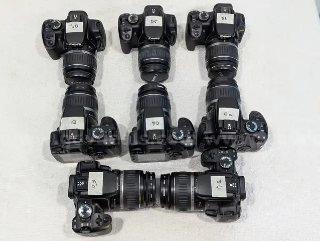 Lot of Canon SLR Cameras and IKAN monitors (8 x Rebel Xti with lens and accessories), 2 x IKAN Monitors, Battery Grips