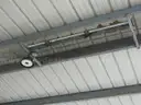 BUILDING, ALUMINUM, STEEL STRUCTURE, 50&#x27; X 120&#x27; PEAK 16&#x27; (ENCLOSED 50&#x27;, OPEN 70&#x27;) B60