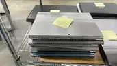 lot of 84 Grade C and as is Apple, HP, Lenovo and Microsoft Laptops. See description!