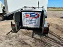 Trailer with a foldable aluminum mast and hoist