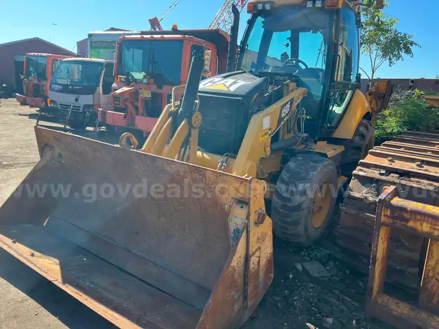 2013 Caterpillar 450F 4WD Loader Backhoe