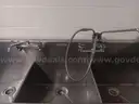 3 bowl stainless steel sink with faucets and spray head with side shelf right side