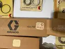 Large Lot of Graco Pump Repair Kits Cylinders etc.
